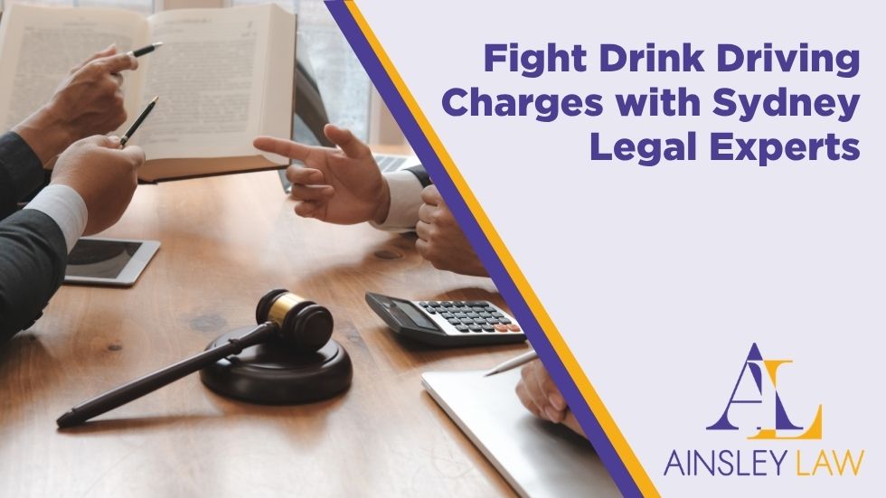 Lawyers discussing a drink driving case with legal documents and a judge's gavel, representing expert drink driving legal defence in Sydney.