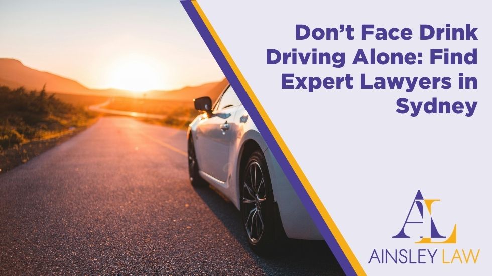 Car driving on an open road at sunset representing expert drink driving lawyers and legal assistance in Sydney.
